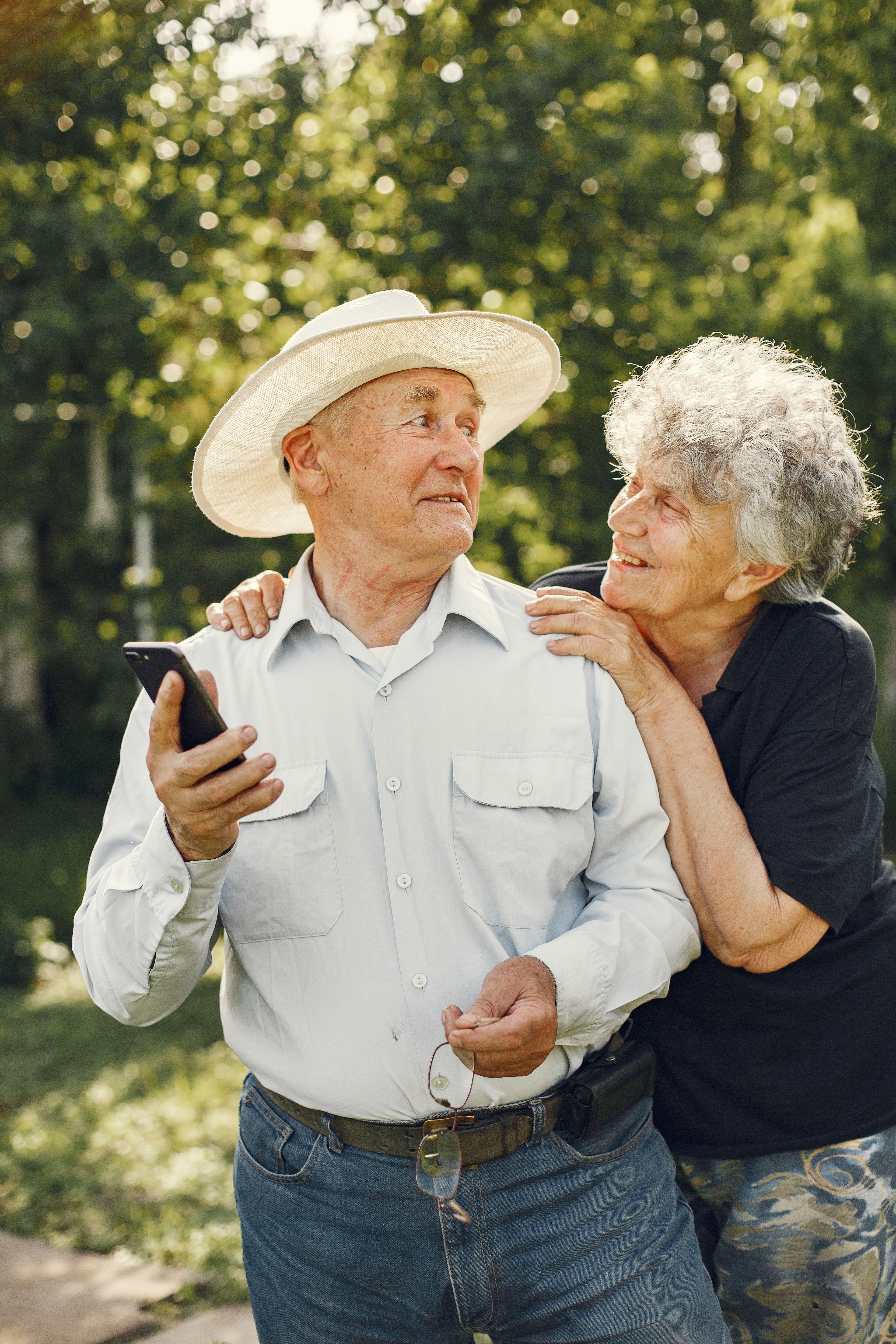 Older couple reading a text message together